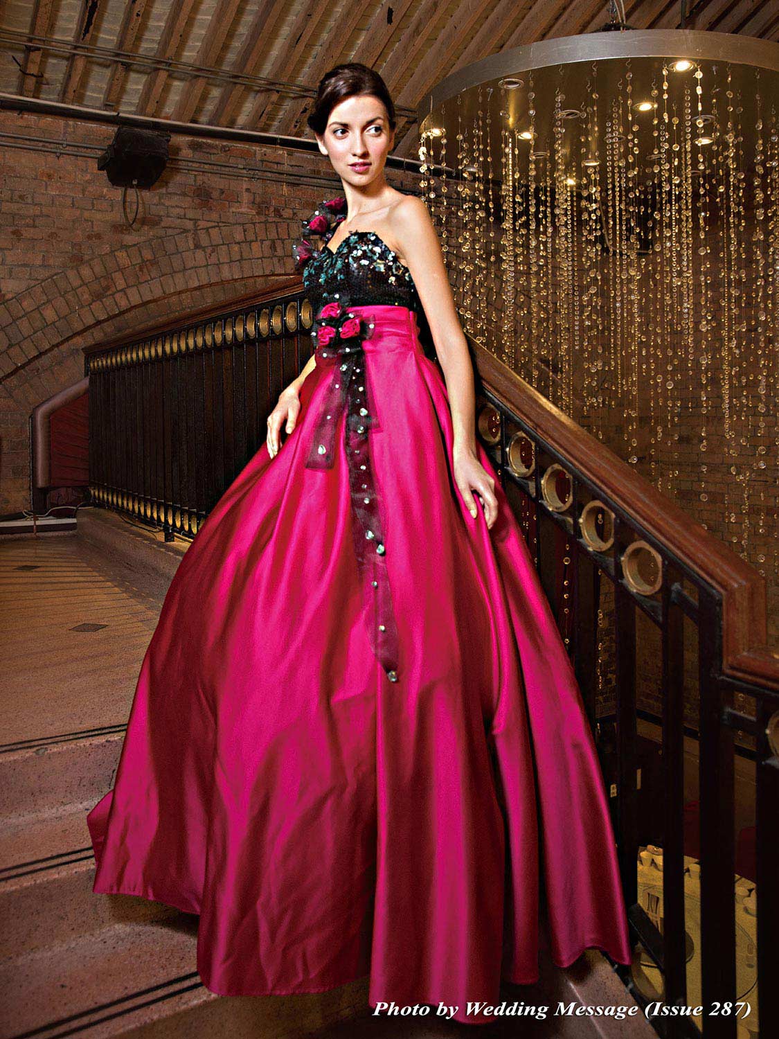 One-shoulder, floor-length, empire waistline evening gown with a sweetheart neckline, contrasting colour bodice embellished with sequins. Colour: Black and Fuschia 單膊, 心形胸, 黑色蕾絲閃片上身, 高腰款,桃紅色裙擺晚裝傘裙